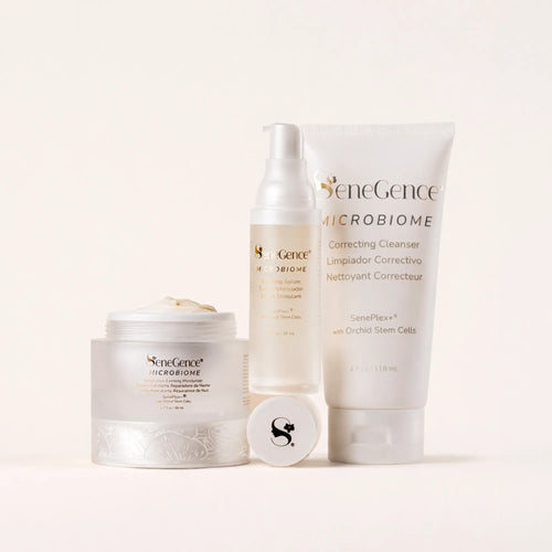 SeneGence Microbiome Regimen Set MX with cream in a jar serum bottle and cleanser tube on a pale background