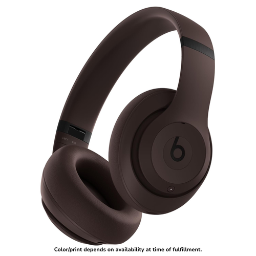 Brown Beats Studio Pro over-ear headphones with cushioned ear cups and adjustable headband.