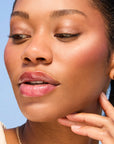 Model wearing Glowify Long-Lasting Eyeshadow Stick product shade Cocoa.