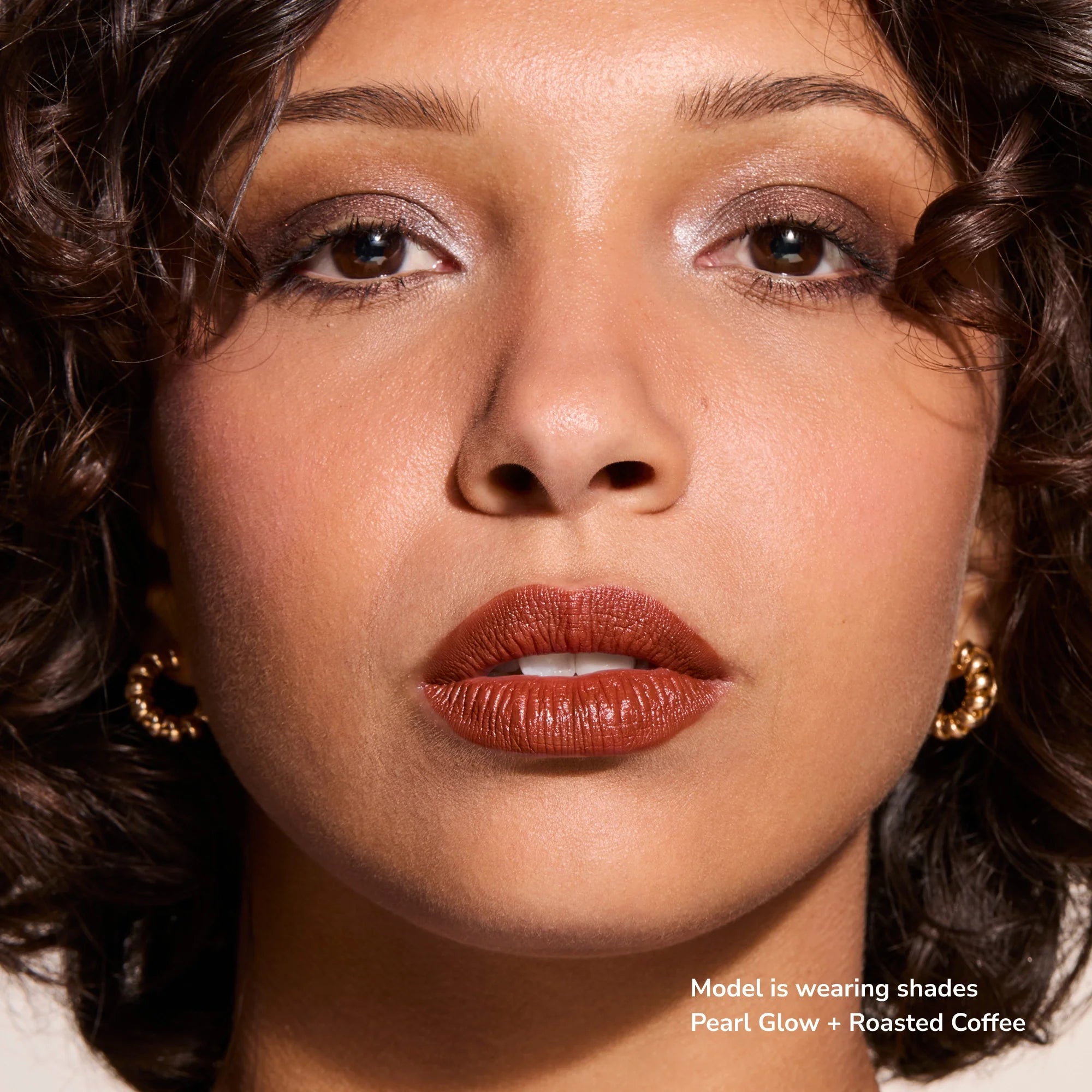 Model wearing Glowify Long-Lasting Eyeshadow Stick product shade Pearl Glow.