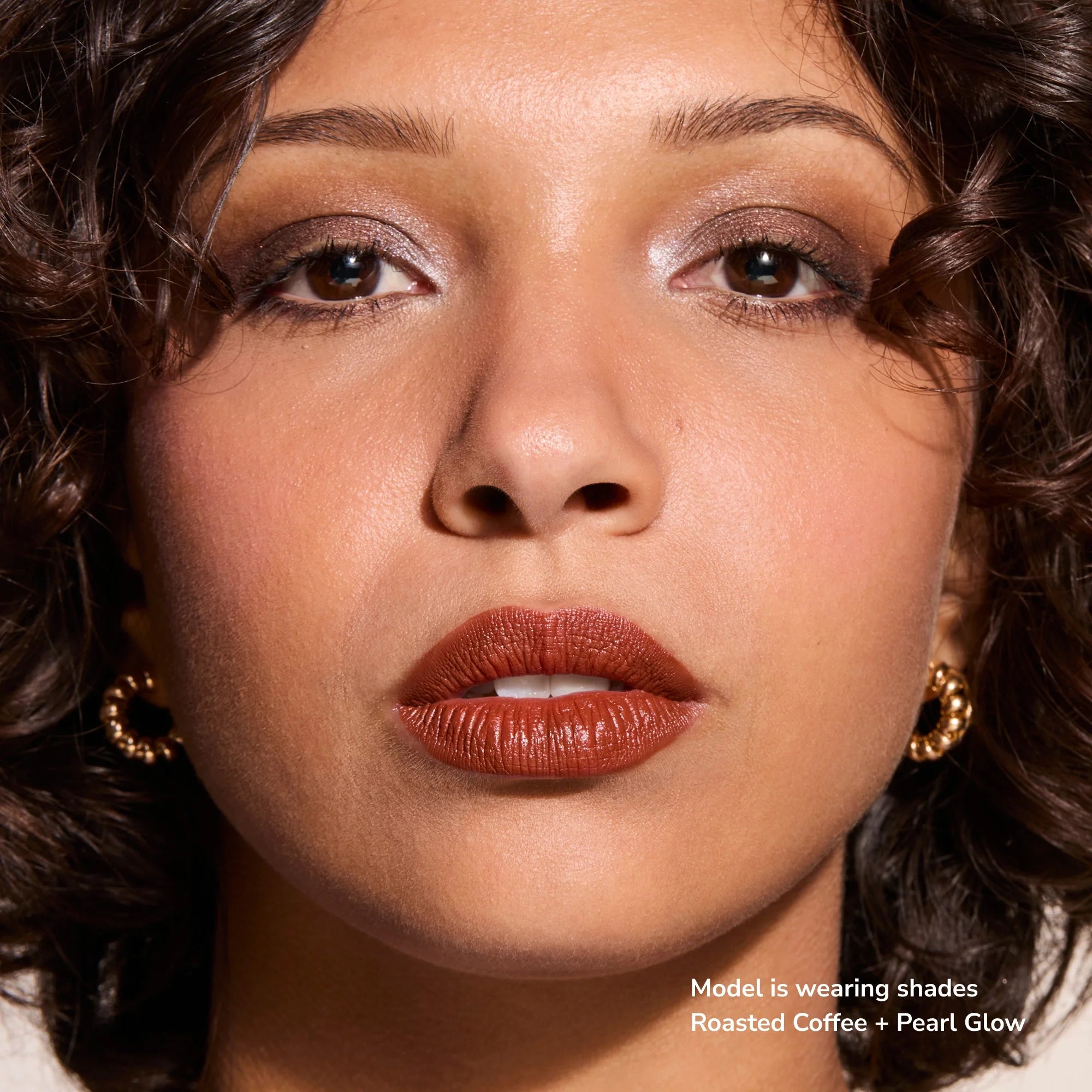 Model wearing Glowify Long-Lasting Eyeshadow Stick product shade Roasted Coffee.