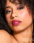 Model wearing Glowify Long-Lasting Eyeshadow Stick product shade Smoked Charcoal.