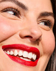 Model wearing LipSense Cream product shade Blu-Red.