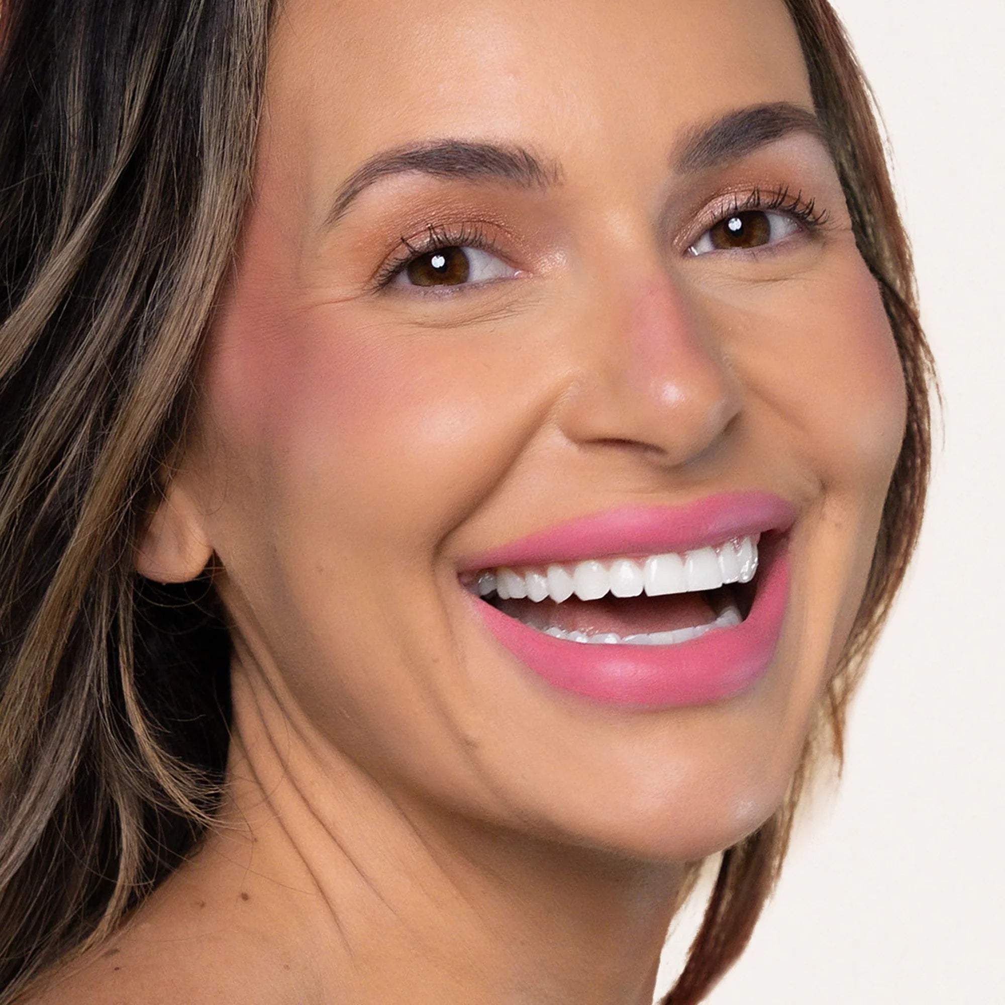 Model wearing LipSense Cream product shade Pink Suede.