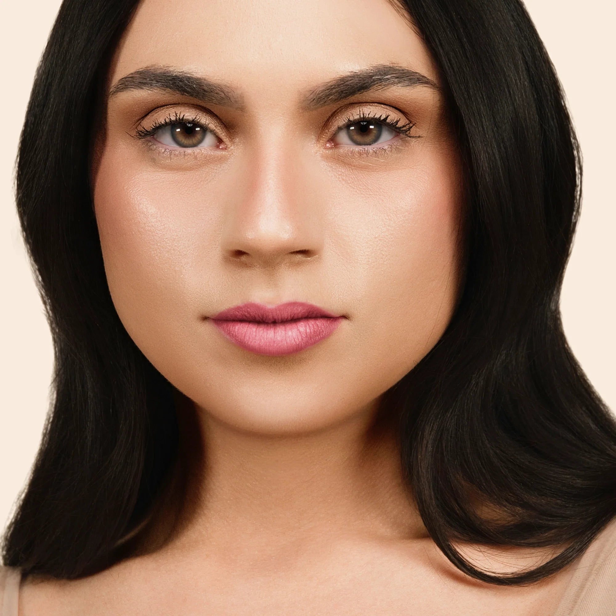 Model wearing LipSense Cream product shade Winter Rose.