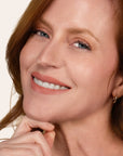 Model wearing LipSense Cream product shade Seashell.