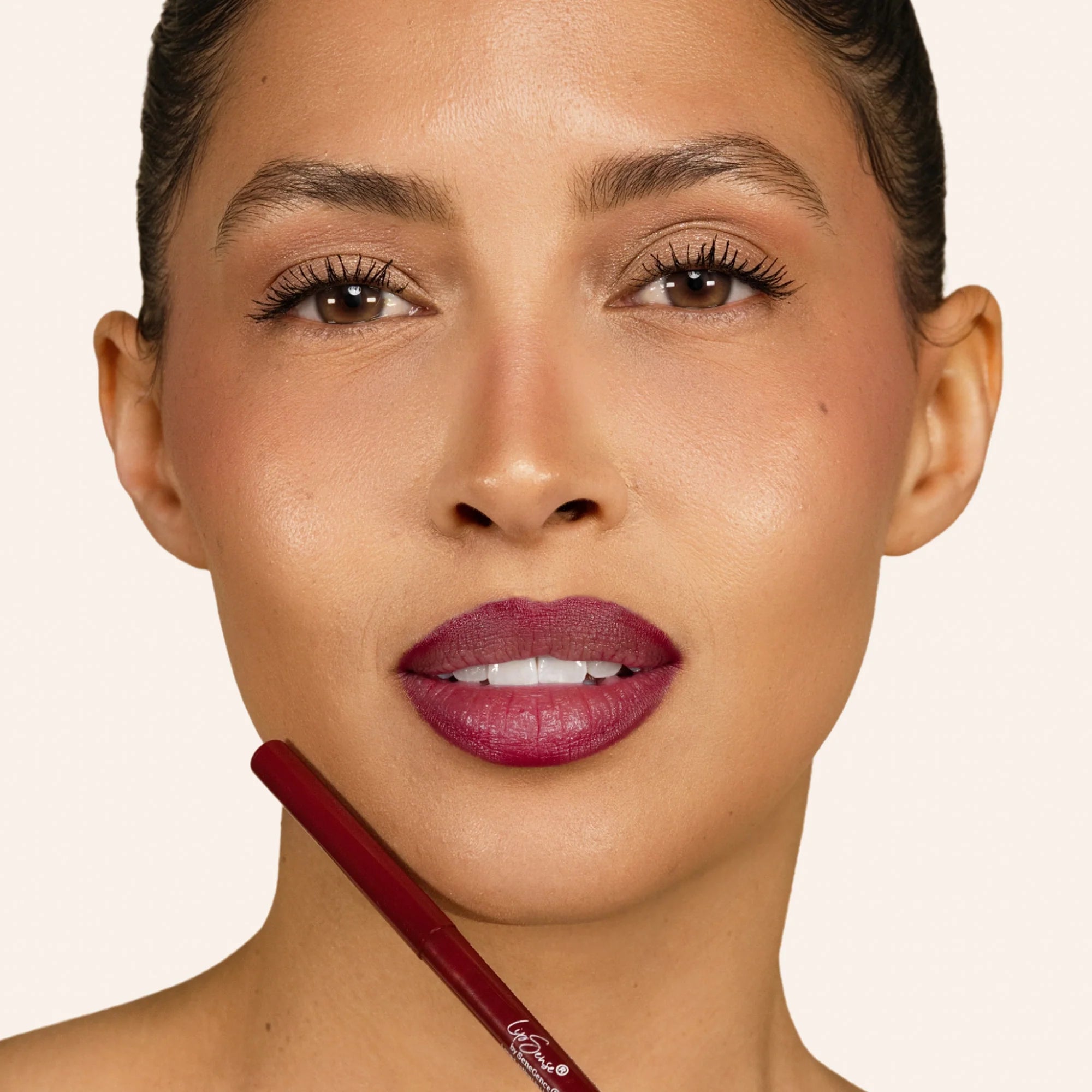 Model wearing LipSense Long-Lasting Lip Liner Pencil product shade Cherry Blaze.