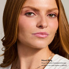 Portrait of a woman with soft pink lipstick and natural makeup showcasing Mood Ring lip tint