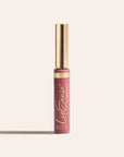 LipSense long lasting liquid lip color in a slim tube with a gold cap and rosy shade