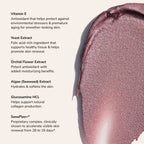 Creamy shimmery pink swatch on beige background with Vitamin E skincare ingredient list.