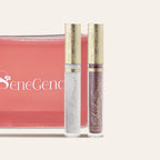 ShadowSense eyeshadow duo in clear tubes with gold ornate caps beside a pink zip pouch