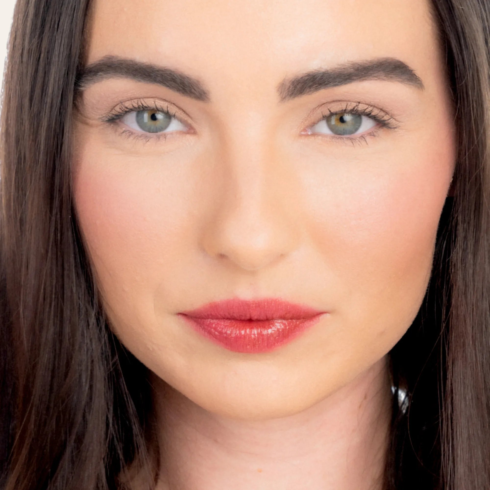 Model wearing LipSense Lip Color shade Caramel Latte product