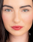 Model wearing LipSense Lip Color shade Caramel Latte product