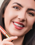 Model wearing LipSense Lip Color shade Earth product