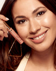 Model wearing LipSense Lip Color shade Nude Honey product