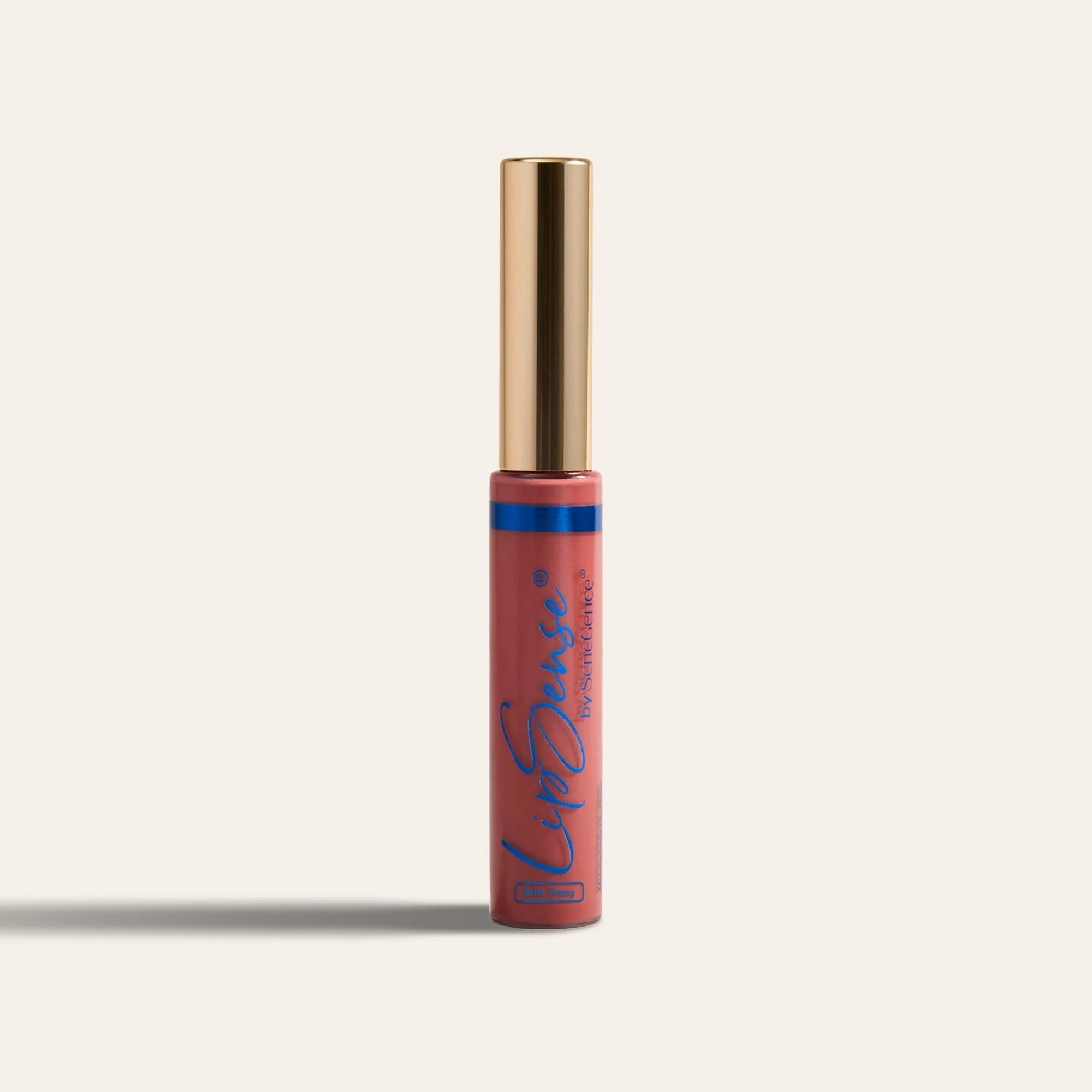 LipSense Moisturizing Gloss NZL in pink nude shade standing upright