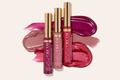 Spanish Beauty Book 10 pack January Edition lip color tubes arranged with pink mauve swatches on a light background.