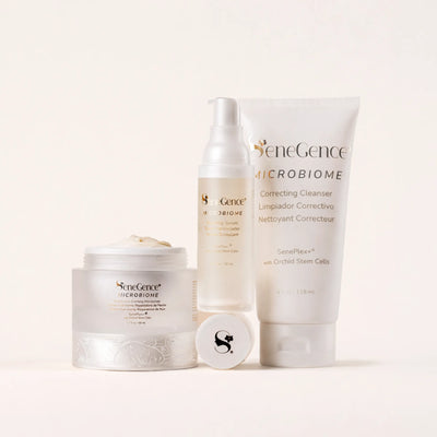 SeneGence Microbiome Regimen Set MX with cream in a jar serum bottle and cleanser tube on a pale background