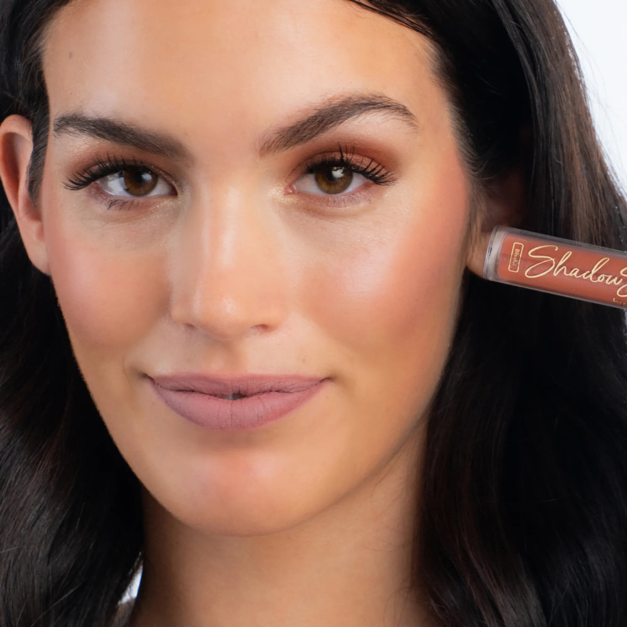 Model wearing ShadowSense product shade Blissful
