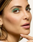 Model wearing ShadowSense product shade Emerald Shimmer