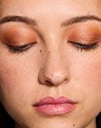 Model wearing ShadowSense product shade Goldstone Shimmer