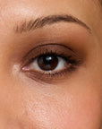 Model wearing ShadowSense product shade Hot Chocolate