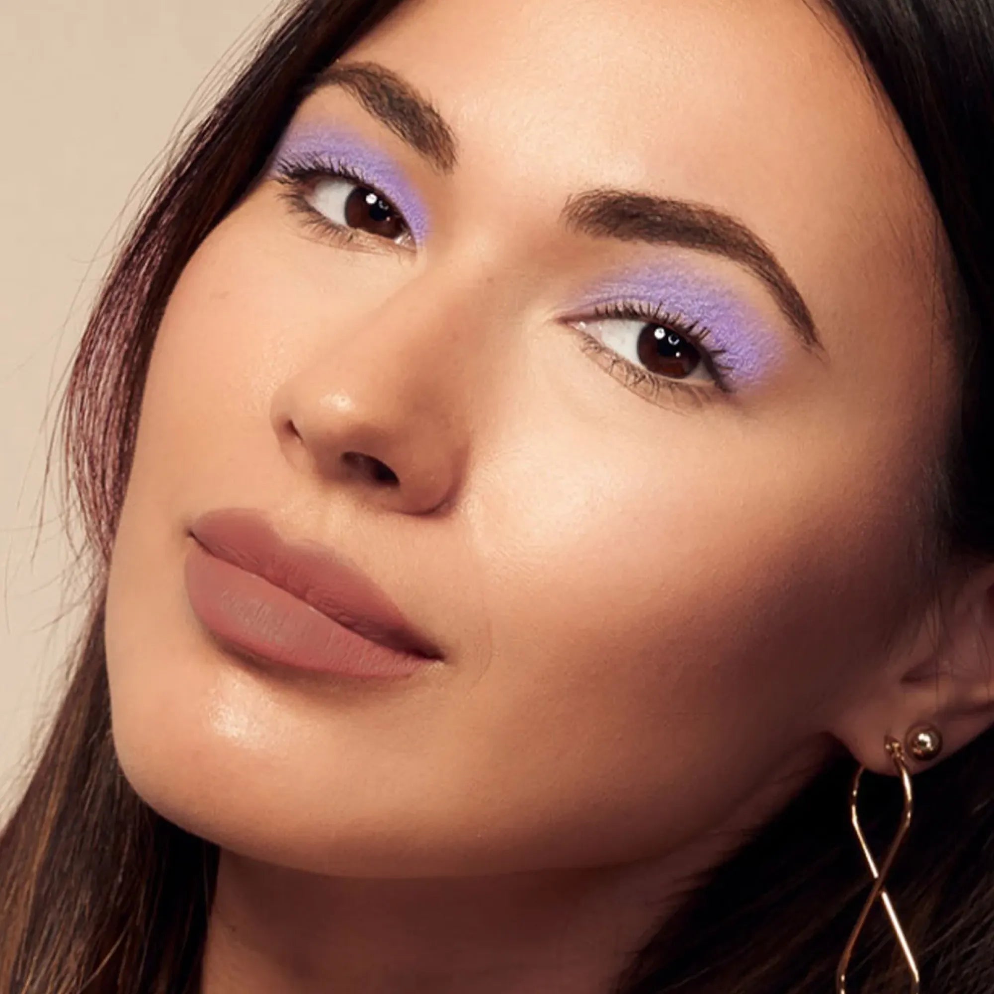 Model wearing ShadowSense product shade Lavender Shimmer